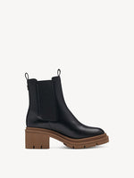 Black ankle boot with beige sole