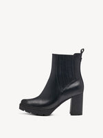 Ankle boot with external side elastic and internal zip