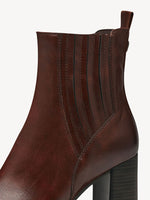 Ankle boot with external side elastic and internal zip