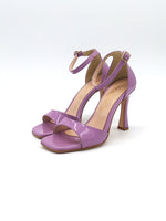 Spool heel sandal with strap and covered heel