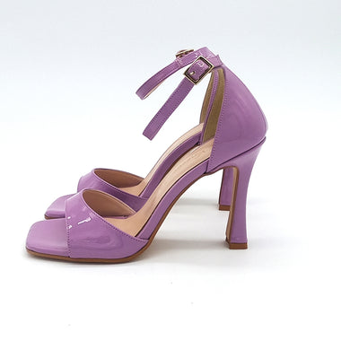 Spool heel sandal with strap and covered heel