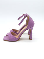 Spool heel sandal with strap and covered heel