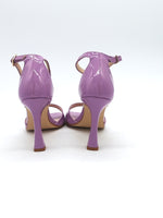 Spool heel sandal with strap and covered heel