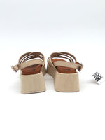 Sandal with woven bands and square wedge